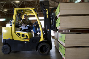 A forklift operator prepares to move material to be shipped as he works at the Dillard-based composites facility at Roseburg Forest Products. 